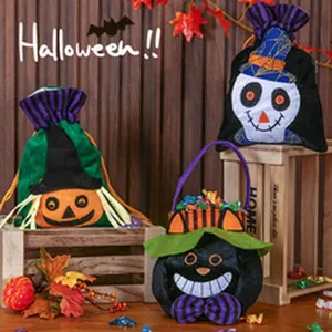 Set of festive Halloween plush treat bags with pumpkin skull and black cat designs