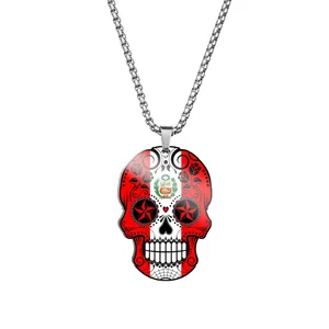 Detailed shot of Peru flag sugar skull pendant on stainless steel chain necklace