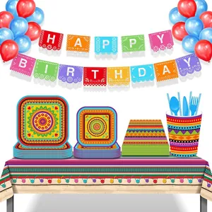Detailed view of Mexican fiesta party tableware set with colorful happy birthday banner