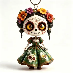 Detail view of a Mexican sugar skull fairy keychain with flower crown and green dress.