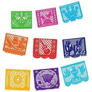 Vibrant Mexican Papel Picado felt banners set for Day of the Dead carnival party decorations.