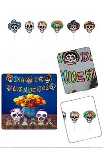 Detailed view of Día de los Muertos cupcake toppers and banner with vibrant skull designs.