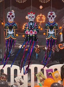 Detailed view of Day of the Dead hanging skull ornaments for Halloween outdoor decoration