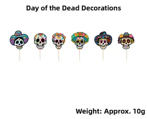 Detailed view of six colorful Day of the Dead sugar skull cake toppers on white background.