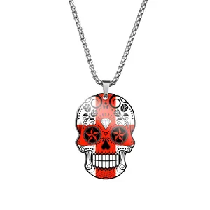 Detailed view of a durable stainless steel sugar skull necklace with red flag pattern print