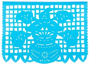 Macro detail view of a bright blue Mexican papel picado cutout banner for festive party decor