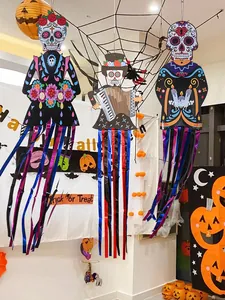 Day of the Dead sugar skull hanging decorations with metallic streamers for Halloween