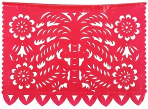 Detailed view of red felt Mexican Papel Picado banner with hollowed palm tree design