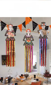 Day of the Dead skeleton hanging ornaments with colorful foil streamers in home setting