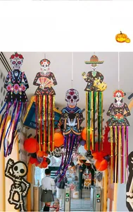 Festive Day of the Dead hanging decorations featuring colorful sugar skulls and metallic streamers