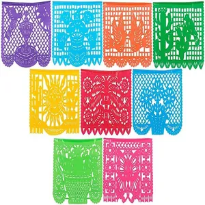 Festive colorful Mexican felt Papel Picado banners with hollowed traditional designs