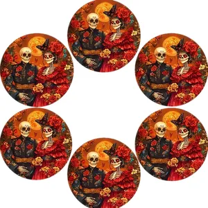 Detailed view of six circular wooden coasters with Day of the Dead skeleton couple art