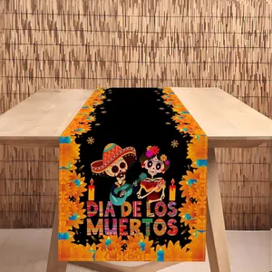 Dia de los Muertos black table runner with sugar skulls and marigold floral decor