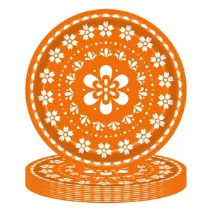 Vibrant orange Mexican Day of the Dead paper plates with white floral mandala designs