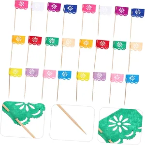 Detail showing the intricate cut-out patterns on colorful felt flag Mexican cake toppers