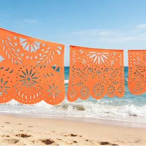 Banderole mexicaine papel picado orange vif pour la décoration de fête du Jour des Morts