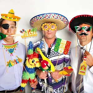 Three men holding colorful Mexican fiesta photo booth props with Cinco de Mayo theme