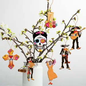 Day of the Dead sugar skull and skeleton wood ornaments on spring blossom branches