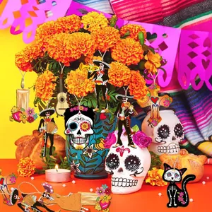 Detailed view of Mexican Day of the Dead wooden hanging ornaments on a marigold plant.