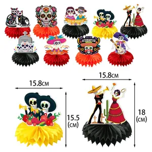 Day of the Dead honeycomb centerpieces with skeleton figures for party decoration