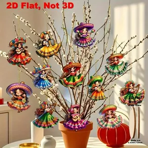 Close-up of vibrant Mexican dancer wooden pendants hanging on decorative branches
