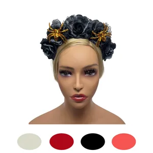 Detail view of a Halloween floral headband with black fabric roses and gold glitter spiders