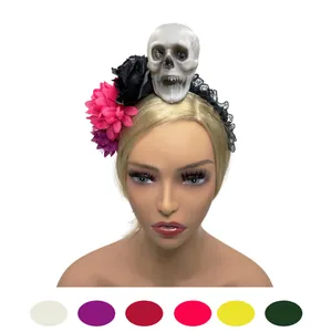 Detailed view of Halloween headband with skull decoration, black lace, and vibrant flowers
