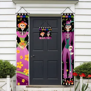 Three-piece Day of the Dead skull banner set displayed on a white house front door