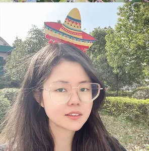 A young woman wearing a colorful mini Mexican sombrero headband for festive party celebrations