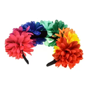 Close-up detail of the vibrant rainbow fabric flowers on the Mexican party headband