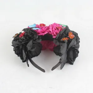 Detailed view of Mexican Day of the Dead headband with black and pink peonies.