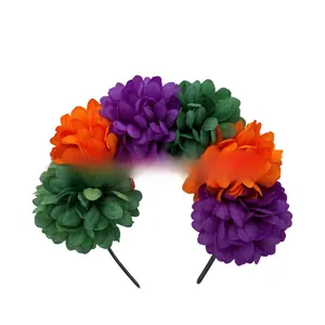 Detailed view of Halloween fabric flower headband with purple orange and green blossoms