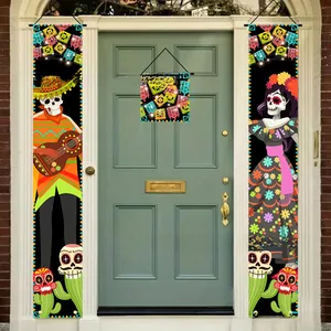 Detail view of Day of the Dead banners showing vibrant skull and guitar patterns on a door.