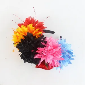 Detailed view of colorful Mexican style floral headband with vibrant fabric flowers