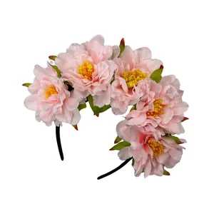 Detail view of pink faux peony floral headband for Day of the Dead and party celebrations