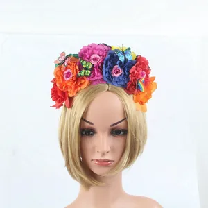 Colorful Mexican Day of the Dead floral headband with butterfly details on a mannequin