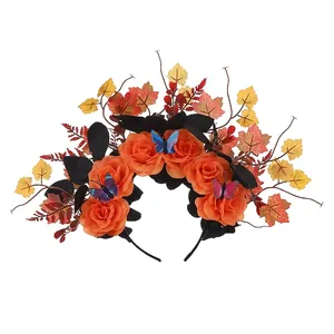 Detailed view of the Halloween headband with orange roses and colorful butterflies