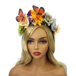 Mexican style floral headband with butterflies displayed on a blonde mannequin head