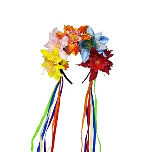 Detail of vibrant artificial flowers and long colorful ribbons on Mexican headband