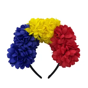 Vibrant flower headband with large blue, yellow, and red fabric blossoms for festive parties.