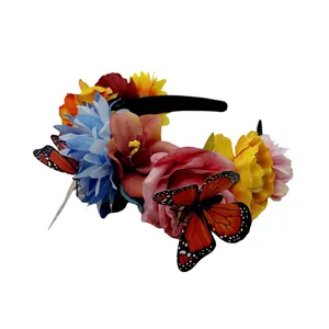 Vibrant Mexican-style floral headband with colorful faux flowers and monarch butterfly accents