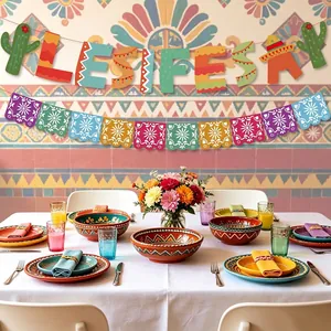 Festive Mexican party banner set displayed above a colorful and vibrant dining table setup.