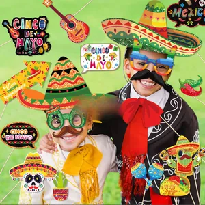 Kids posing with 30pcs Cinco de Mayo party photo booth props with colorful designs