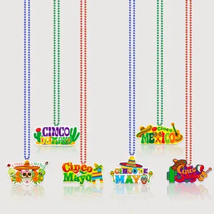 Set of colorful Cinco de Mayo party necklaces with festive Mexican themed pendants