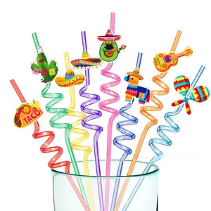 Close-up of colorful Mexican theme spiral straws with cartoon taco and cactus toppers