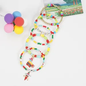 Colorful Cinco de Mayo beaded bracelets set with festive chili and piñata charms detail