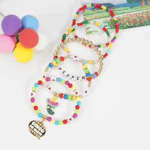 Close-up of Cinco de Mayo bohemian beaded bracelet set featuring chili pepper charms