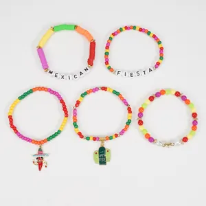Set of colorful Mexican Cinco de Mayo party bracelets with cactus and chili charms