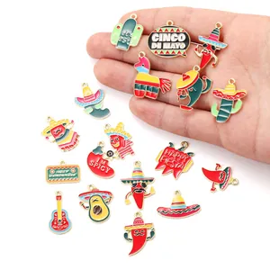 Detailed view of colorful Mexican Fiesta enamel charms featuring chili and guitar