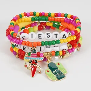 Close-up detail of colorful Cinco de Mayo beaded bracelets featuring Mexican fiesta charms